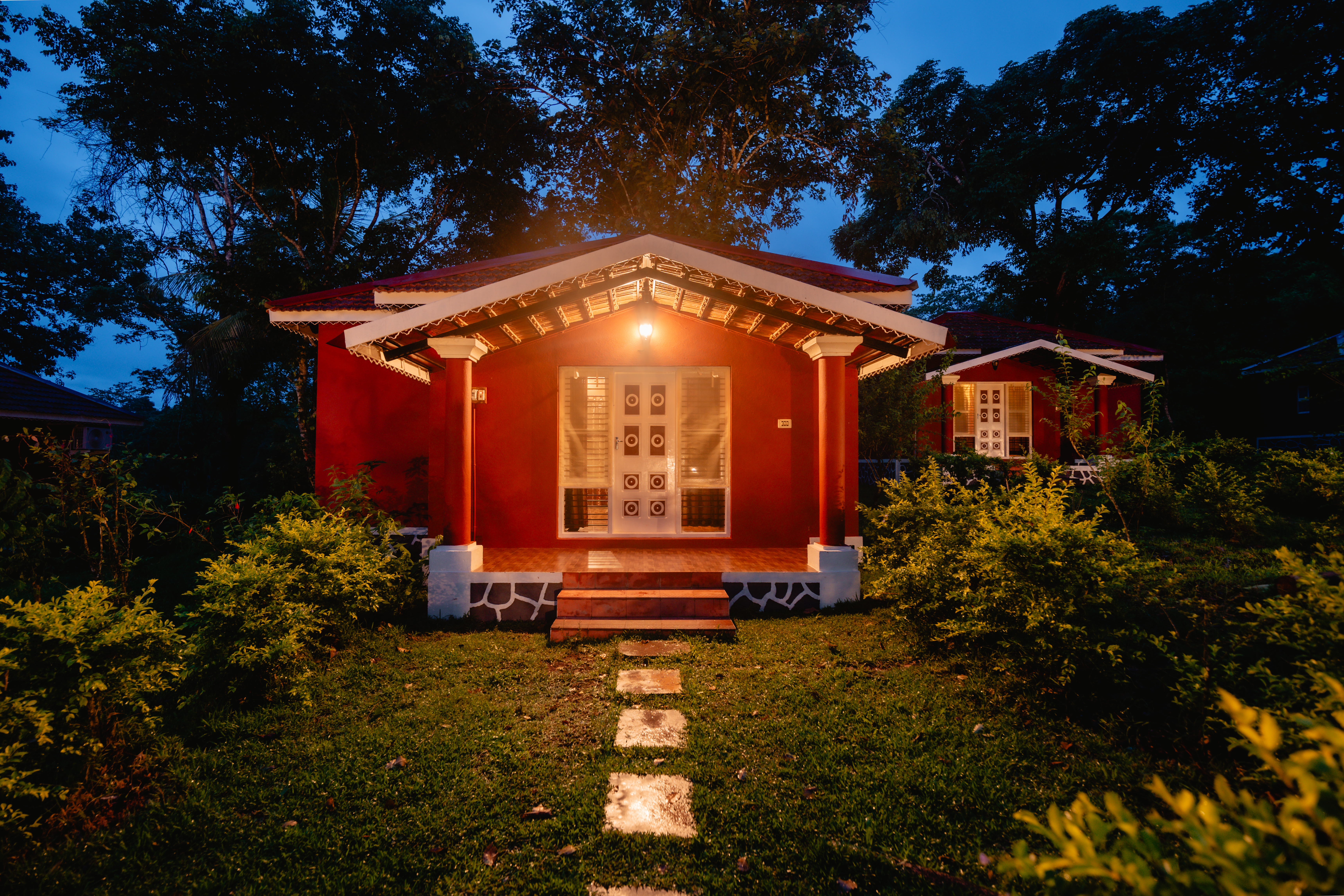 Forest cottage exterior with garden